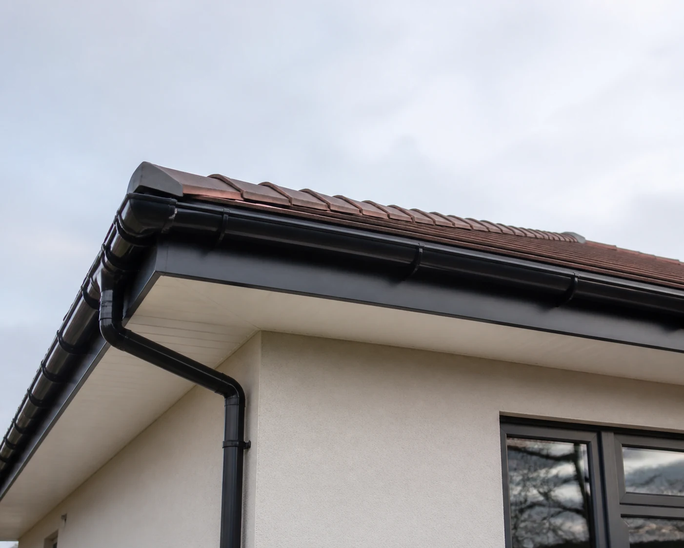Neatly repaired soffits fascia and guttering